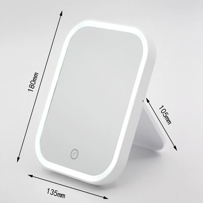 Espelho de maquiagem iluminado por LED ajustável para uma casa compacta e conveniente